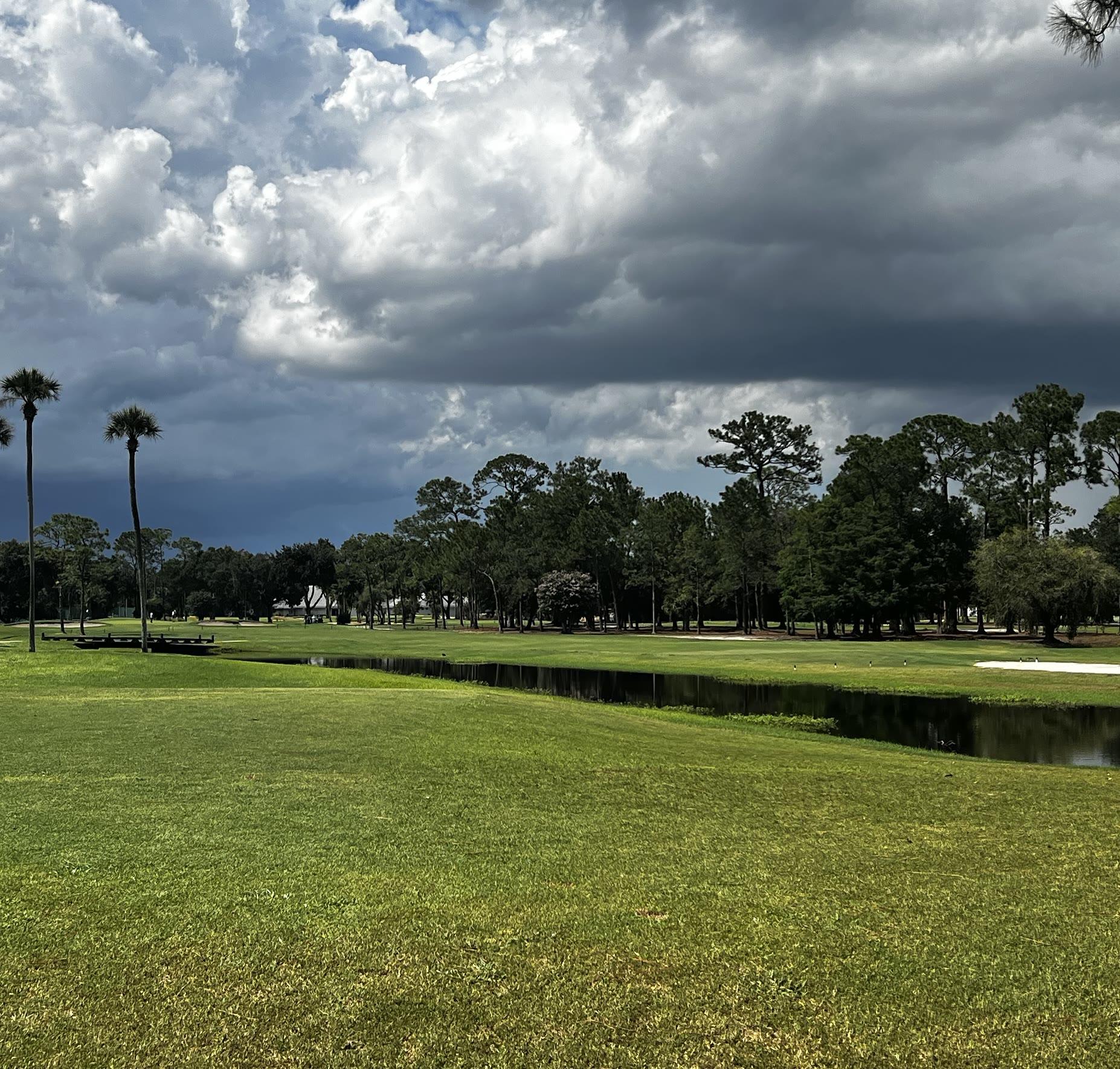 Rio Pinar Golf Club hole 5 beneath a dramatic Florida sky